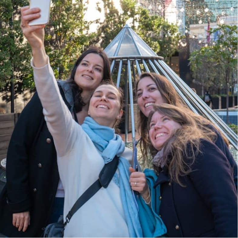 Friends taking selfie at party