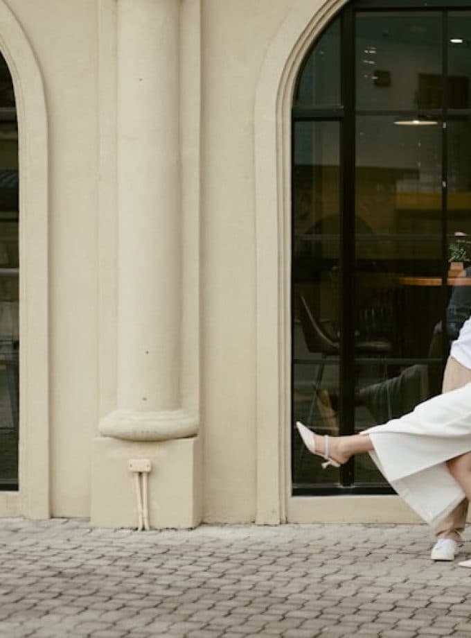 Wedding couple dancing joyfully at their reception