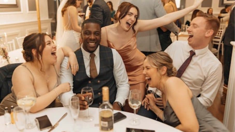 Wedding reception with guests sharing moments