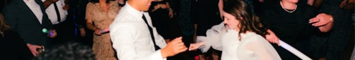 Wedding guests capturing candid moments with their phones