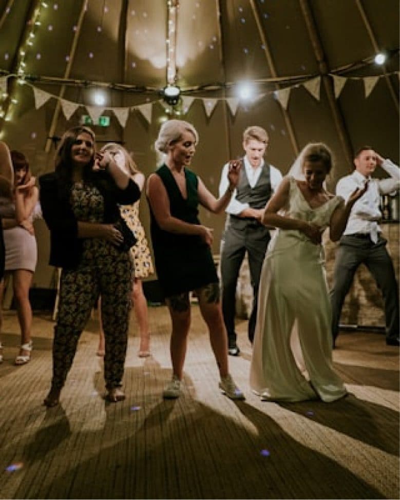 Children dancing freely on the reception floor
