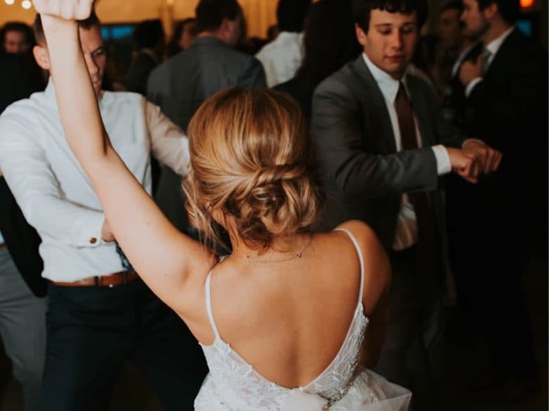 Bride and groom sharing their first dance at the reception
