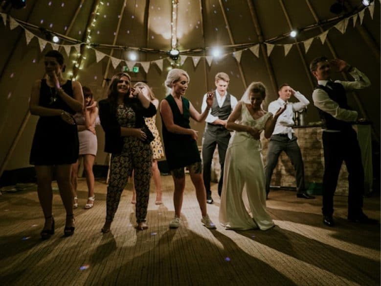 Guests dancing freely at a wedding reception