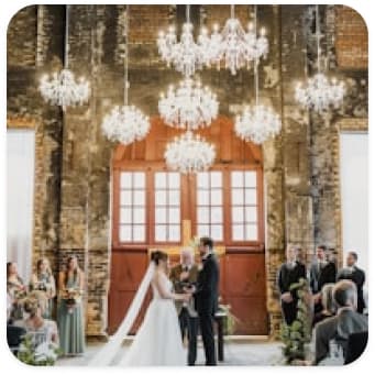 Ceremony under chandeliers