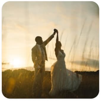 Couple dancing at sunset