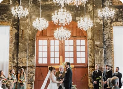 Ceremony under chandeliers