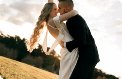 Couple embracing at golden hour