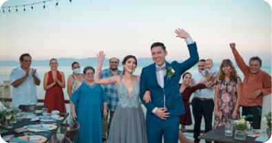 Guests cheering the couple