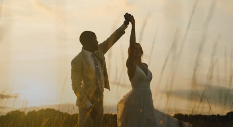 Couple dancing at sunset