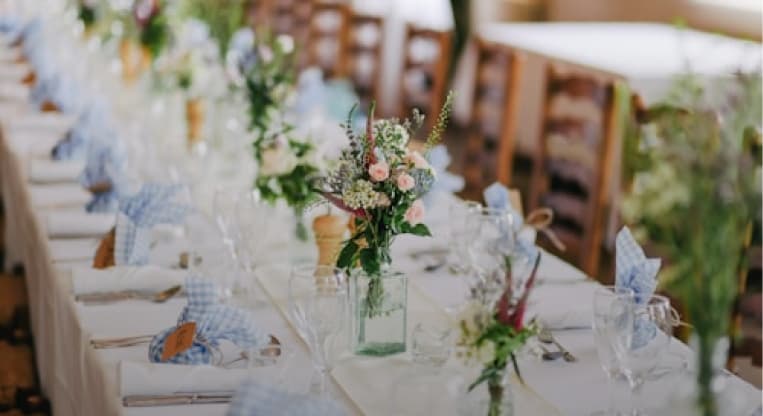 Reception table set with flowers