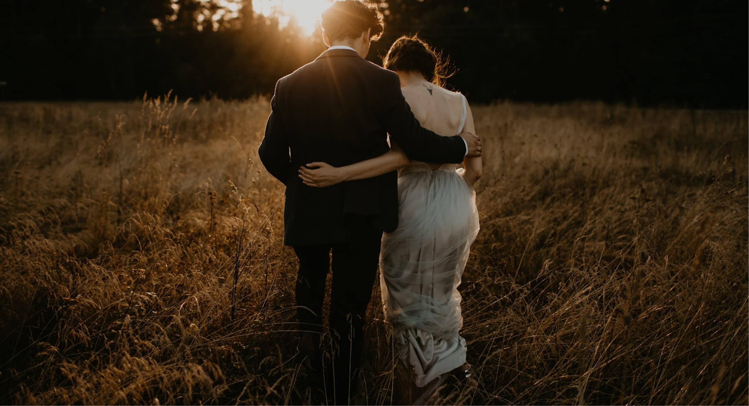 Couple embracing at sunset